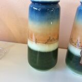 Pair of enamelled sandstone vases