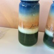 Pair of enamelled sandstone vases