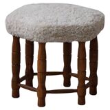 Modern Danish, a hexagonal oak stool, seat reupholstered in lambswool, 1950s.