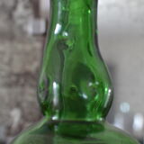 Dented green bottle