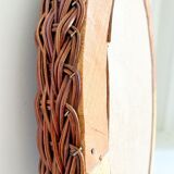 Oval mirror in braided wicker