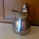 Coffee set in silver metal composed of 3 pitchers, Millan Freres, Paris