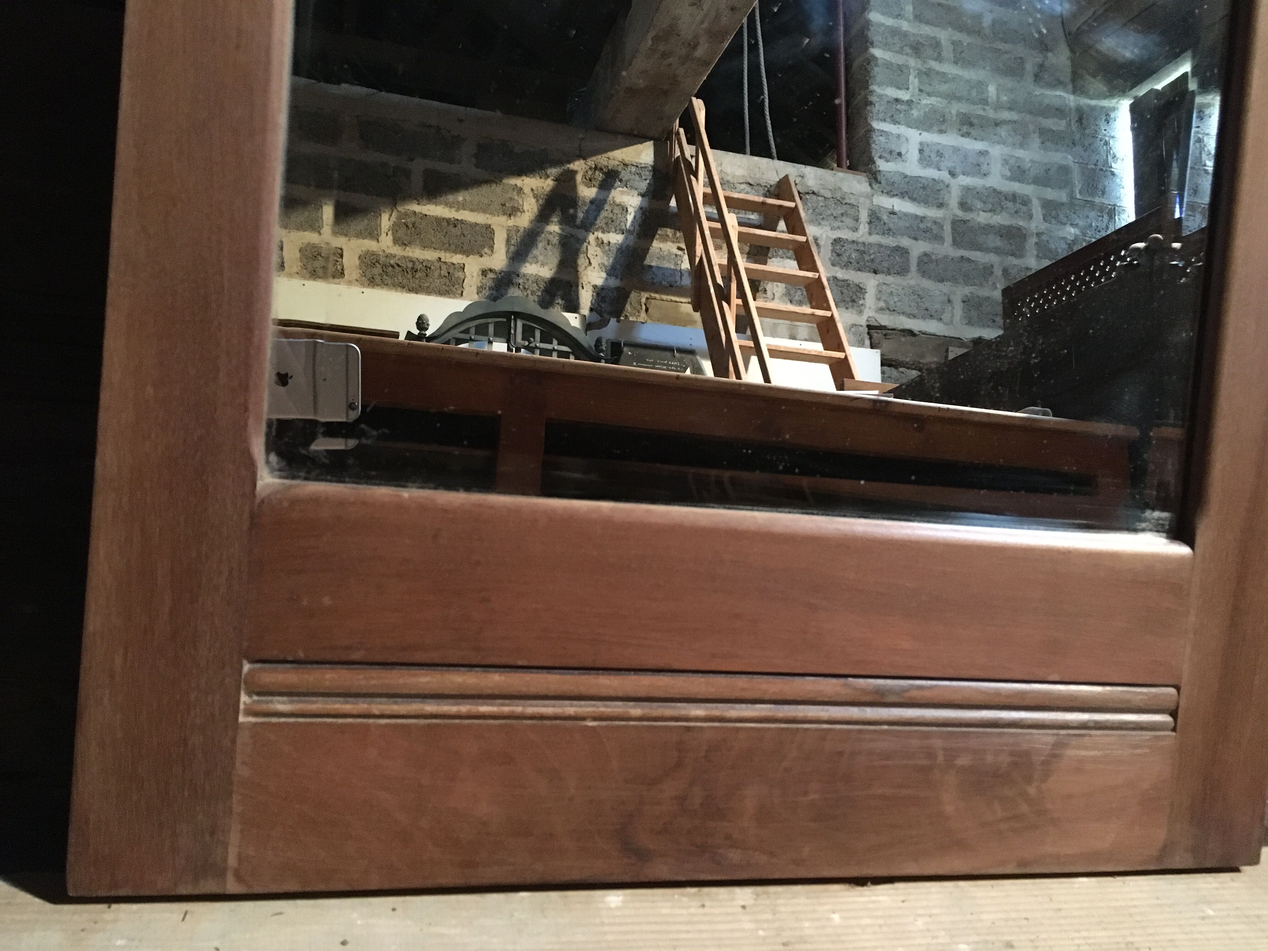 Beveled mirror walnut frame