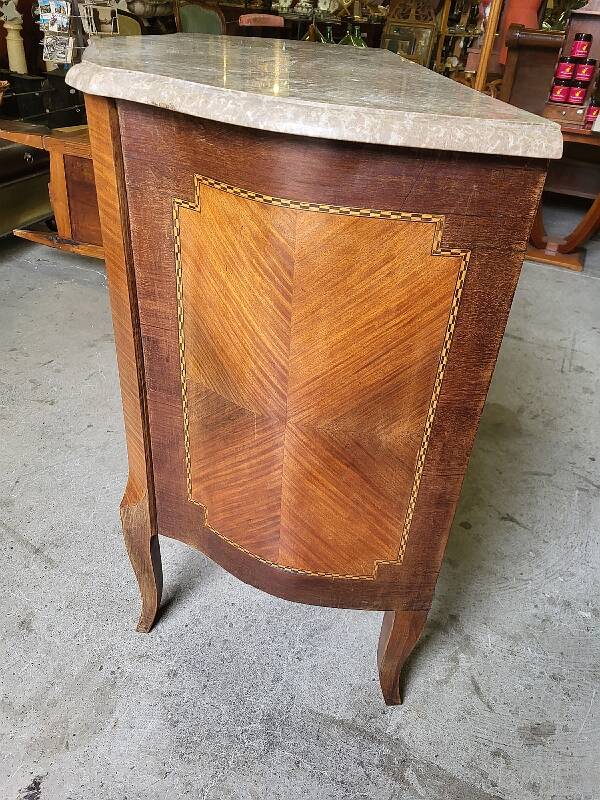 Curved chest of drawers in rosewood and marble marquetry