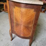 Curved chest of drawers in rosewood and marble marquetry