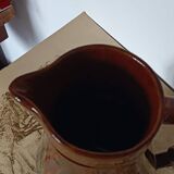 Antique enamelled pitcher