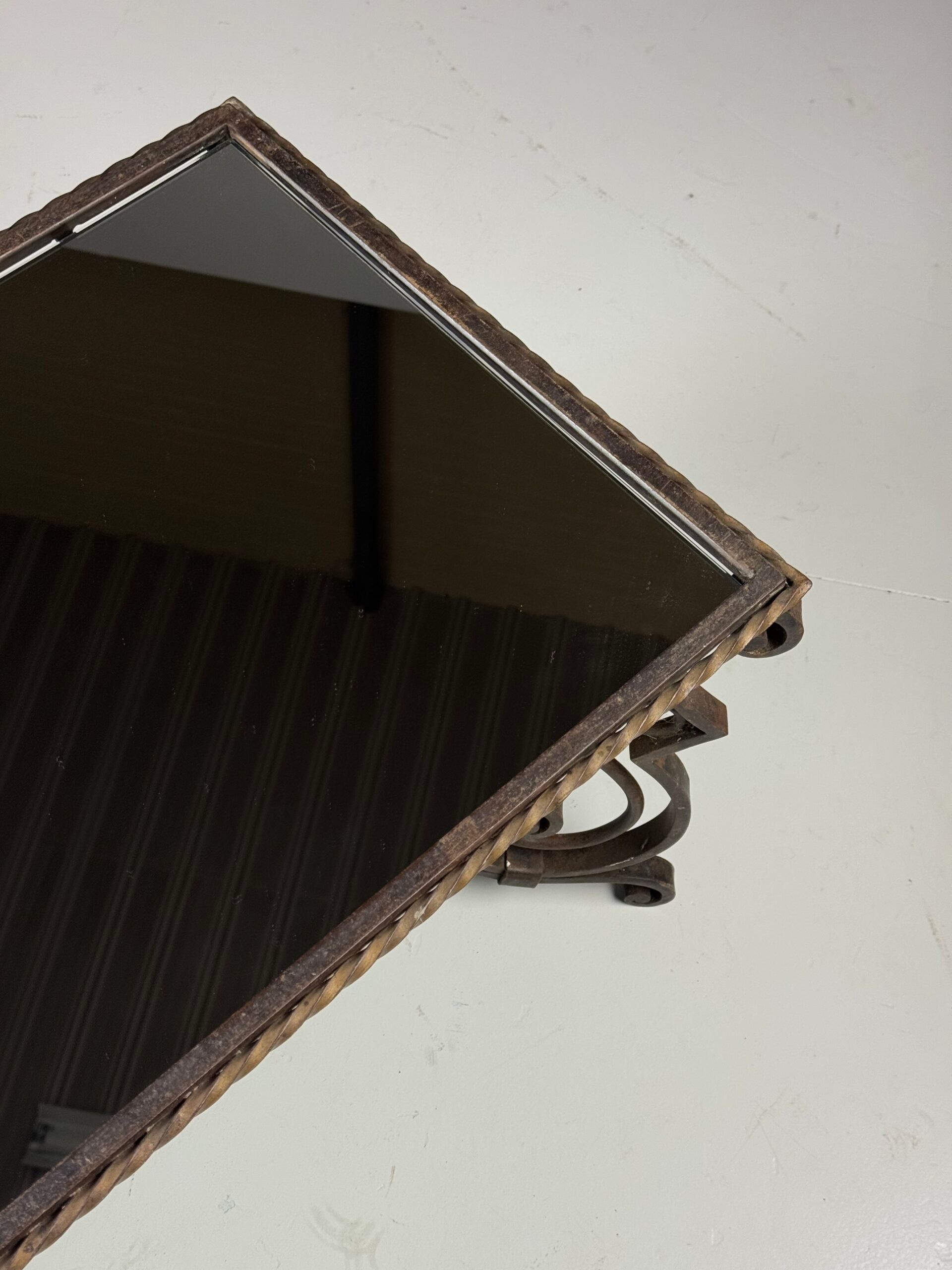 Wrought iron coffee table with mirror glass