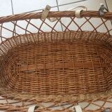 Rattan basket with canopy hoops and wrists
