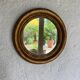 Miroir rond en bois doré ancien