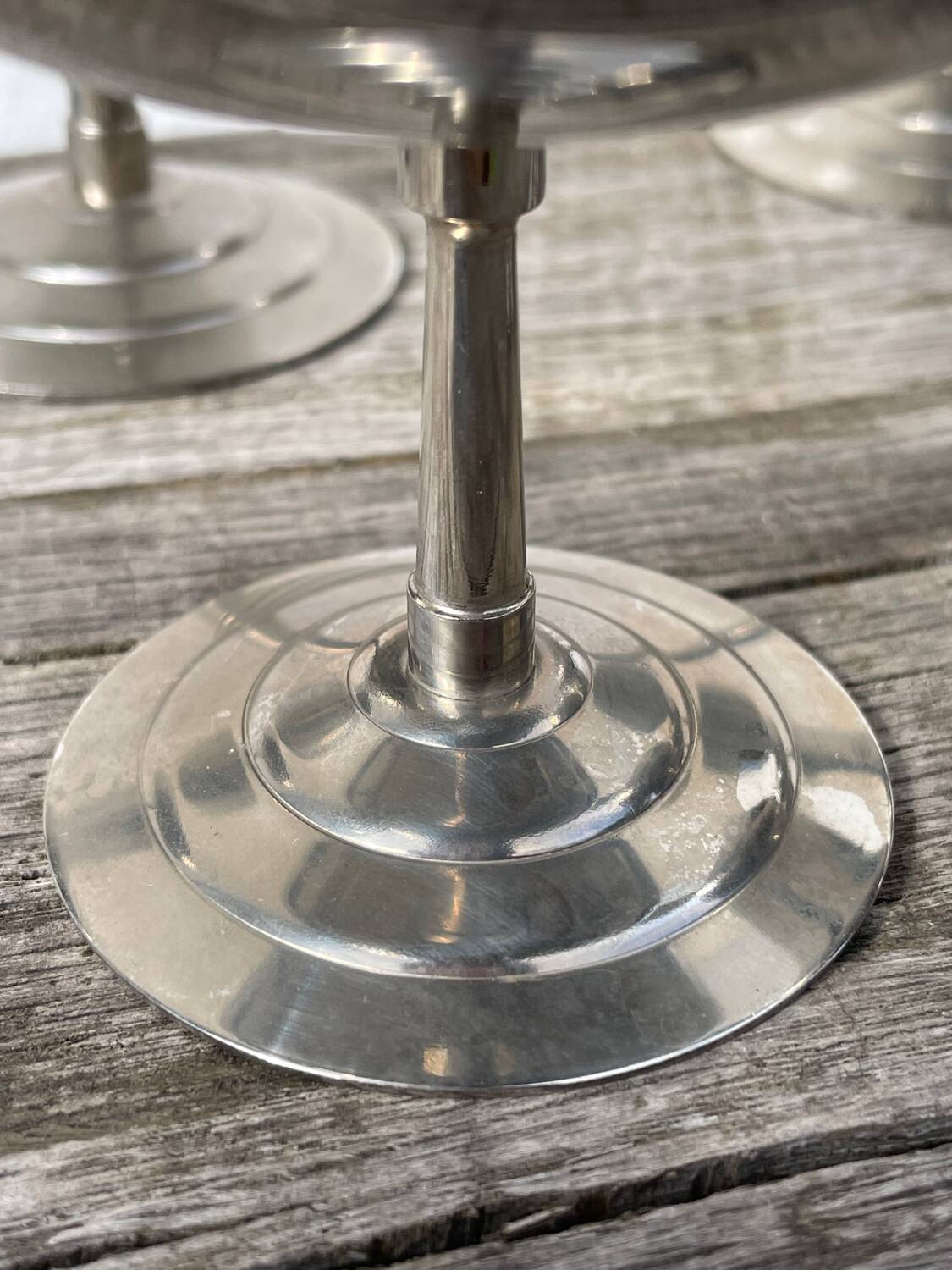 10 stainless steel cups signed Rémy Letang