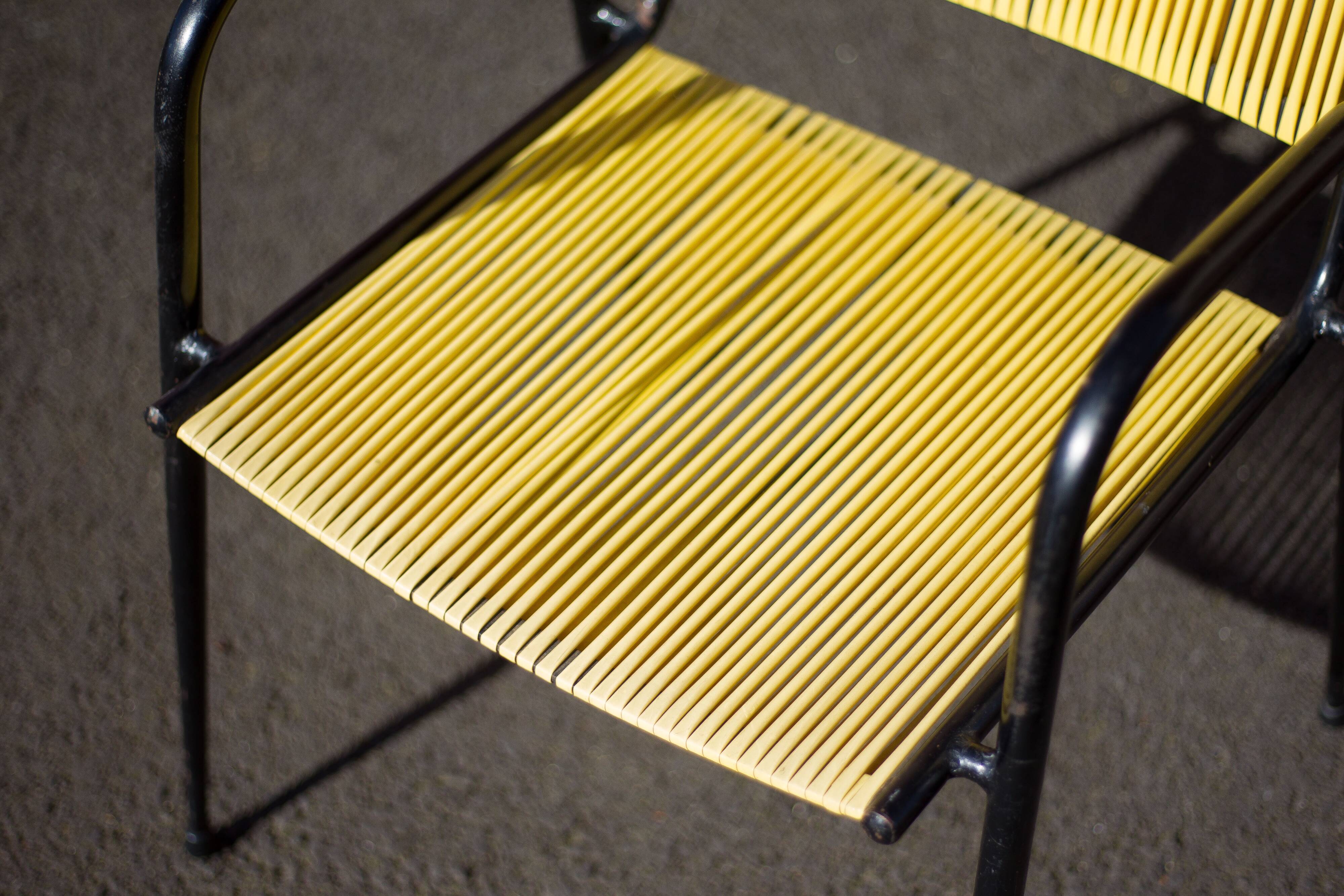 Scoubidou armchair, black metal armchair and yellow plastic wires, vintage chair
