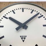Industrial grey factory wall clock from pragotron, 1960s