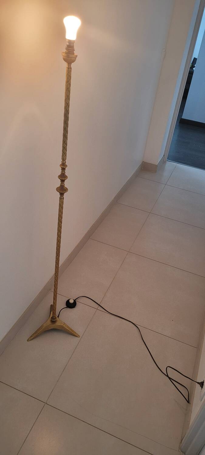 Twisted brass tripod floor lamp