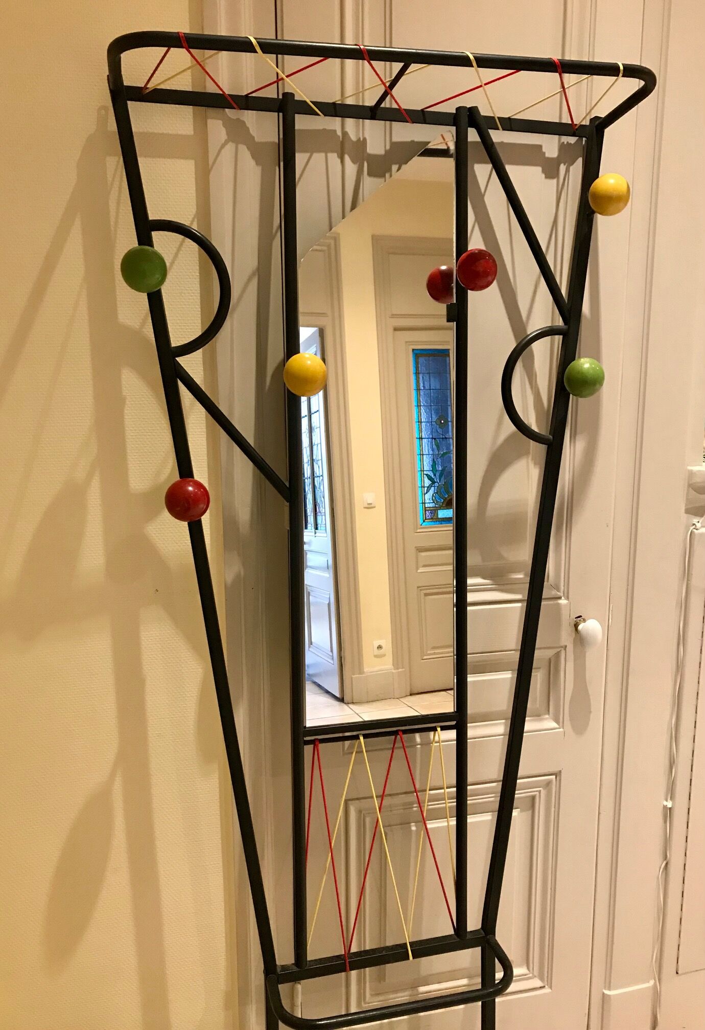 60s wall dressing room door, with colorful balls
