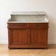Antique wooden and marble washstand.