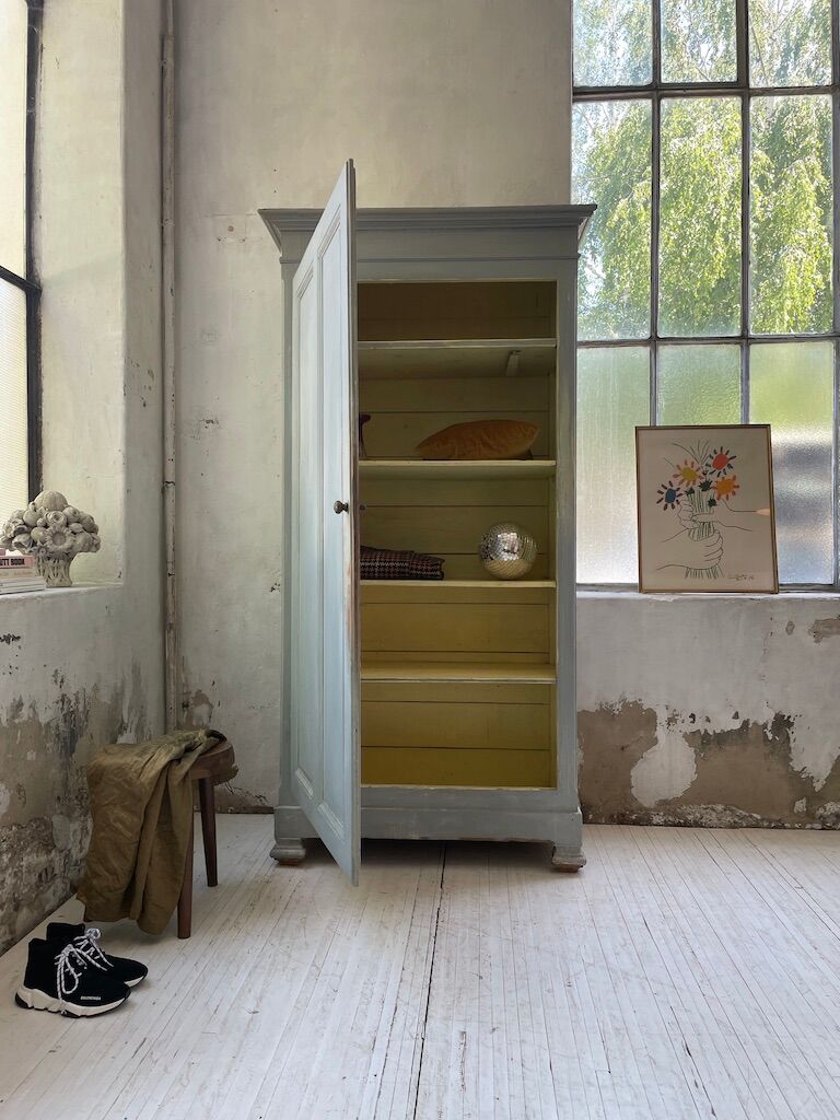 Blue patinated cap cabinet