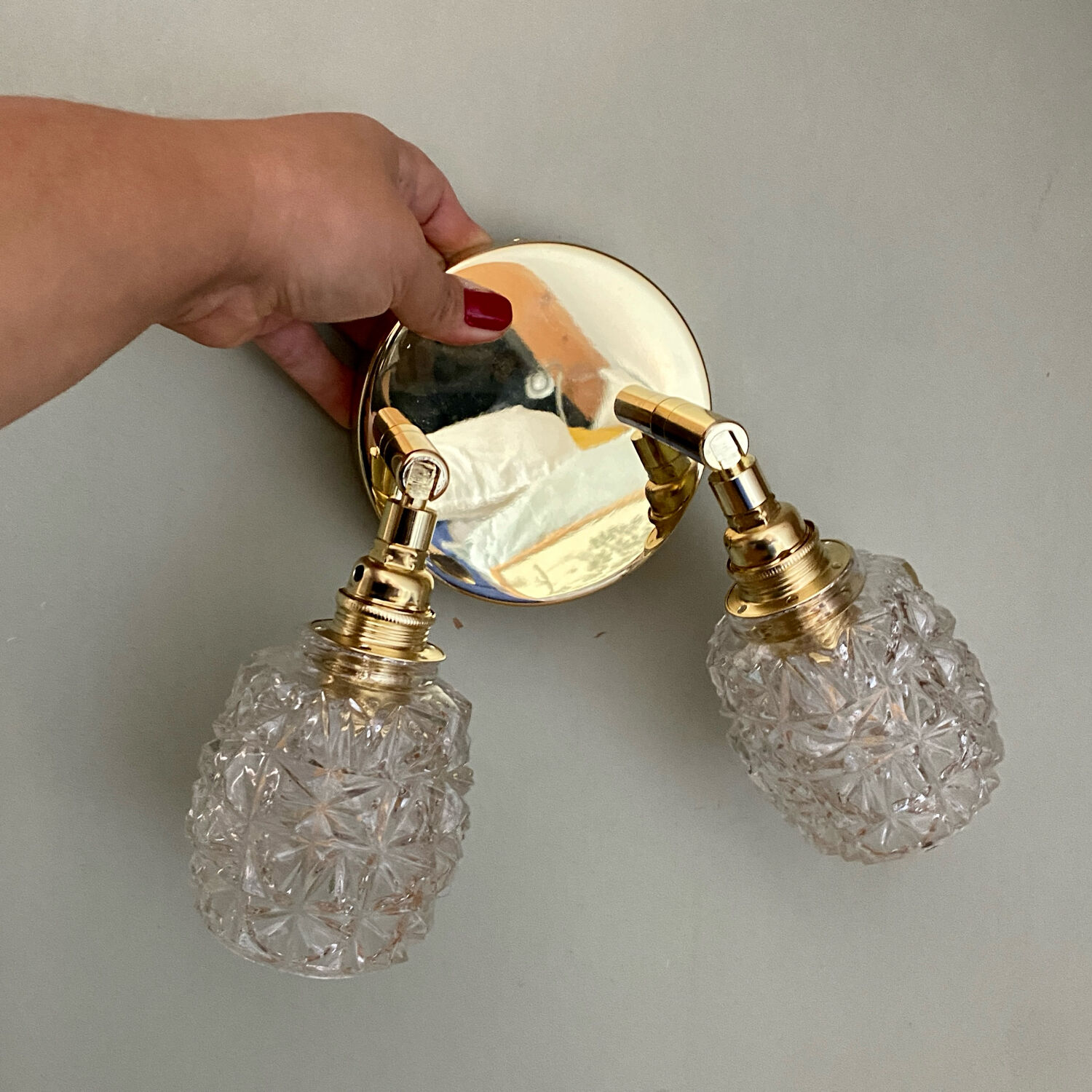 Double vintage tulip wall light in moulded glass.