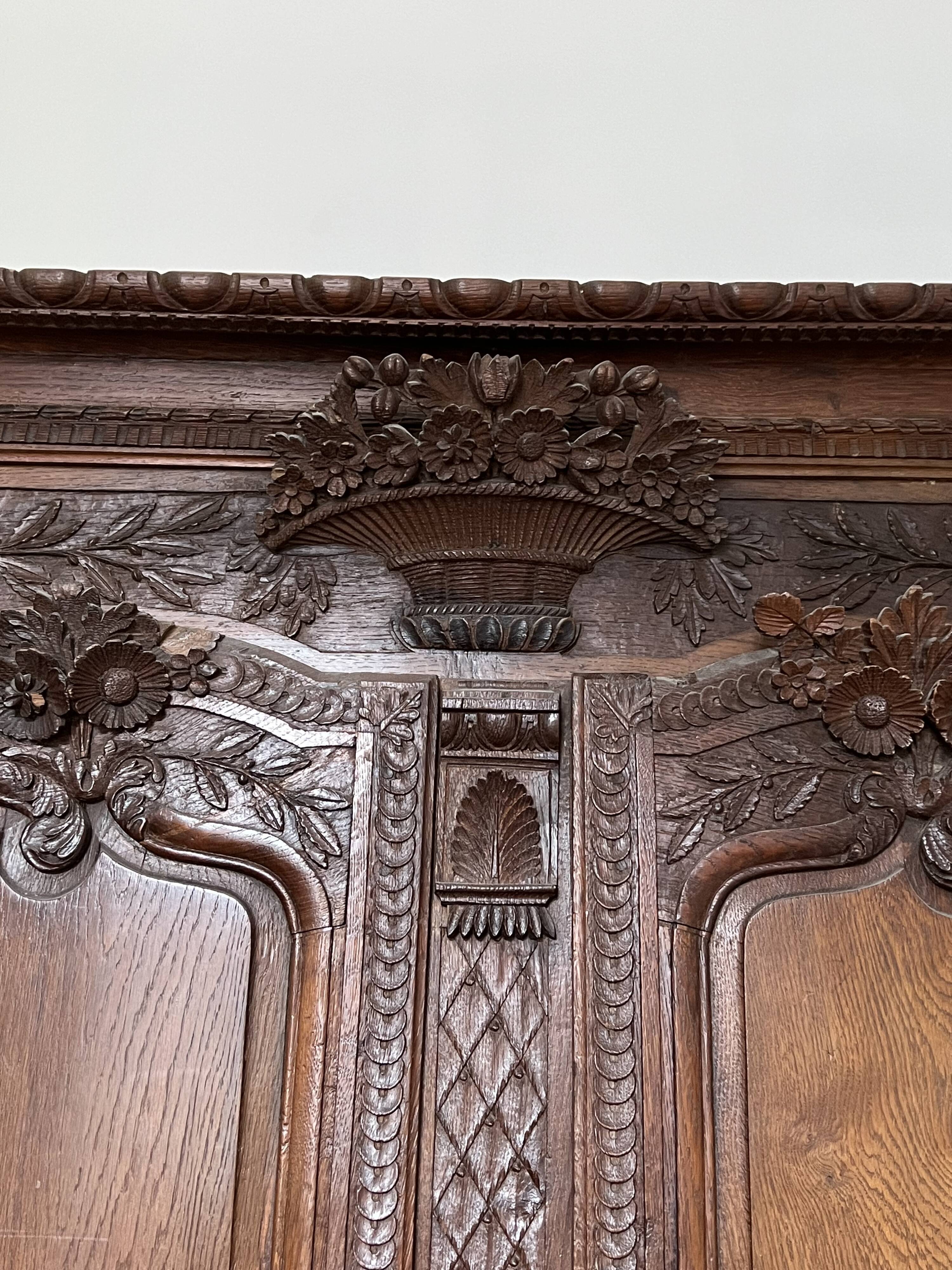 Beautiful and ancient Norman wedding wardrobe, richly carved
