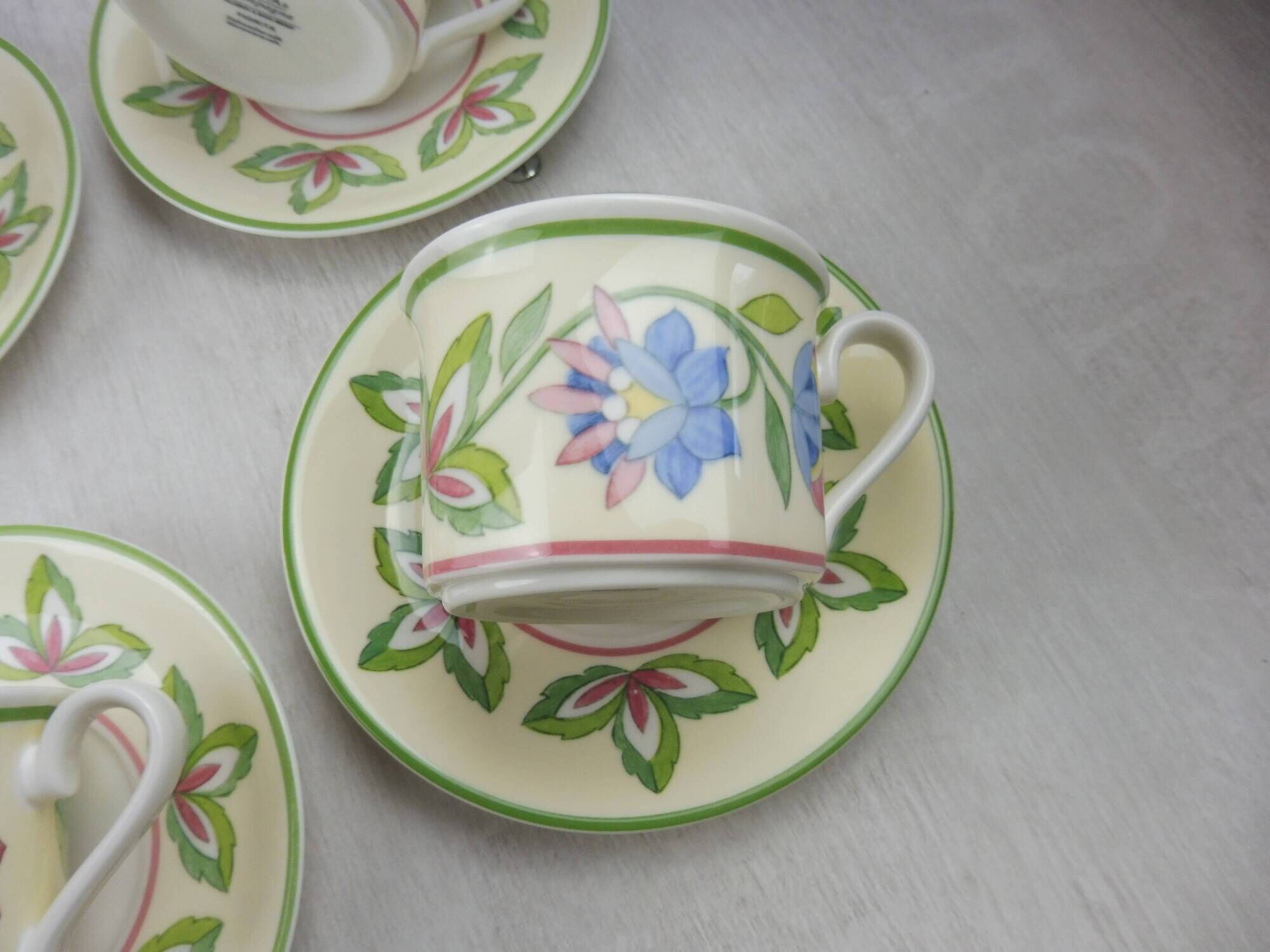 Lot 12 old cups under cups, Fiorita campagna décor, from Villeroy to Boch