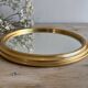 Miroir rond doré vintage