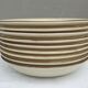 Set 11 plates 1970 Revernay Sarreguemines orange and brown on sandstone background