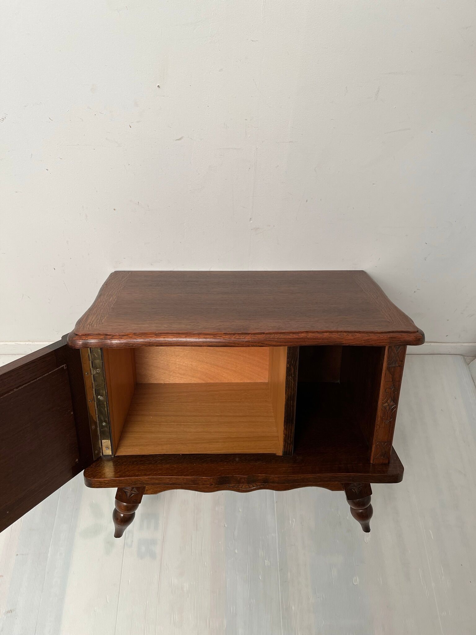 Vintage carved wooden bedside table