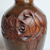 Decorative vase in turned and carved wood, signed "C. Léal", 30 cm