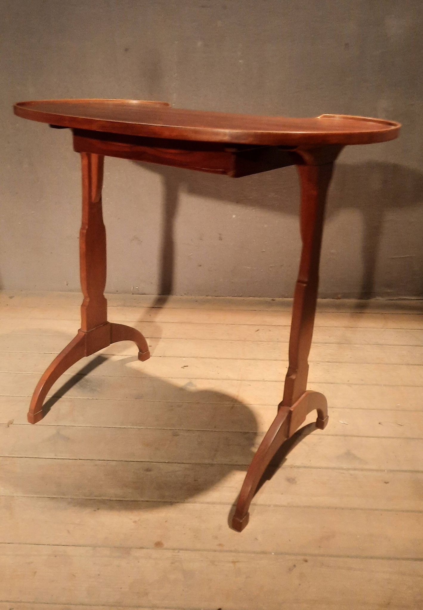 Kidney-shaped side table