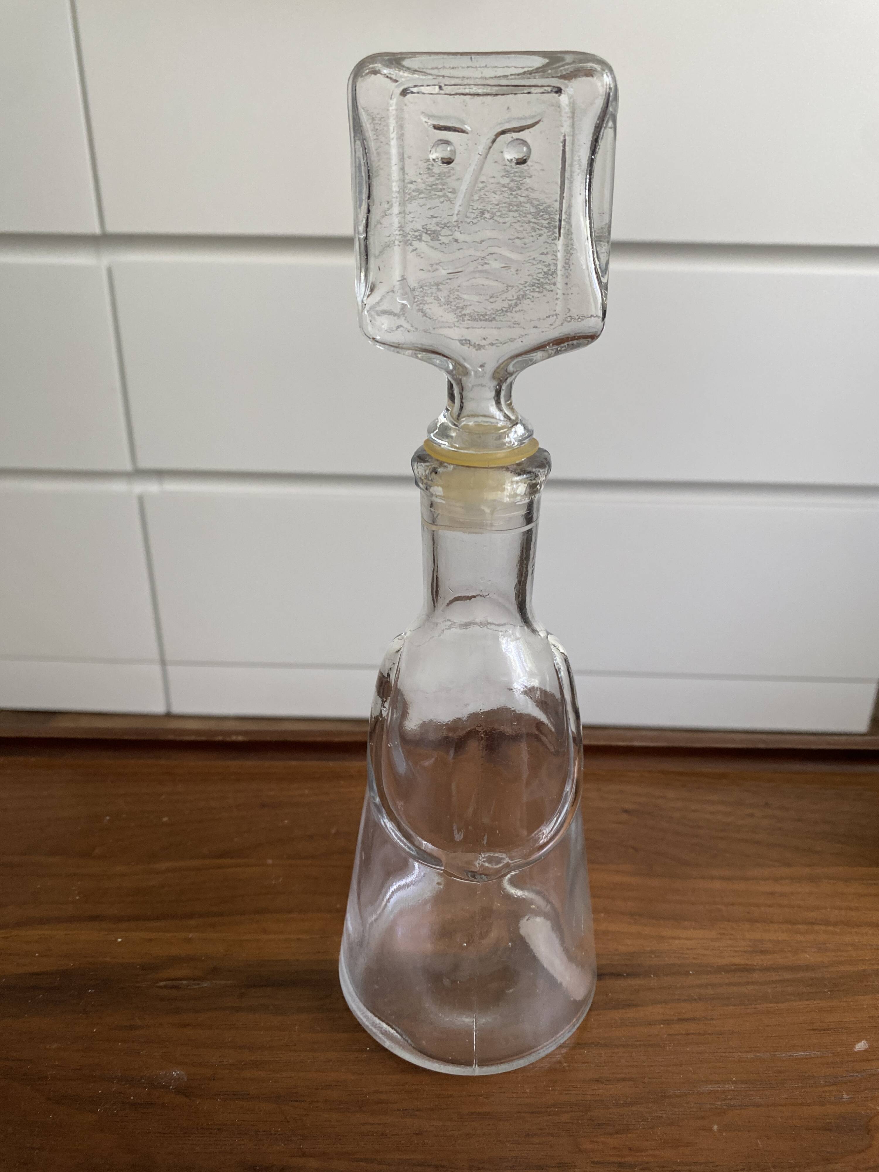 Pair of decanters by Erik Hoglund for Neiman Marcus, "People" series, Kosta Boda