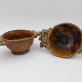 2 stoneware bowls with vine and grape decorations signed