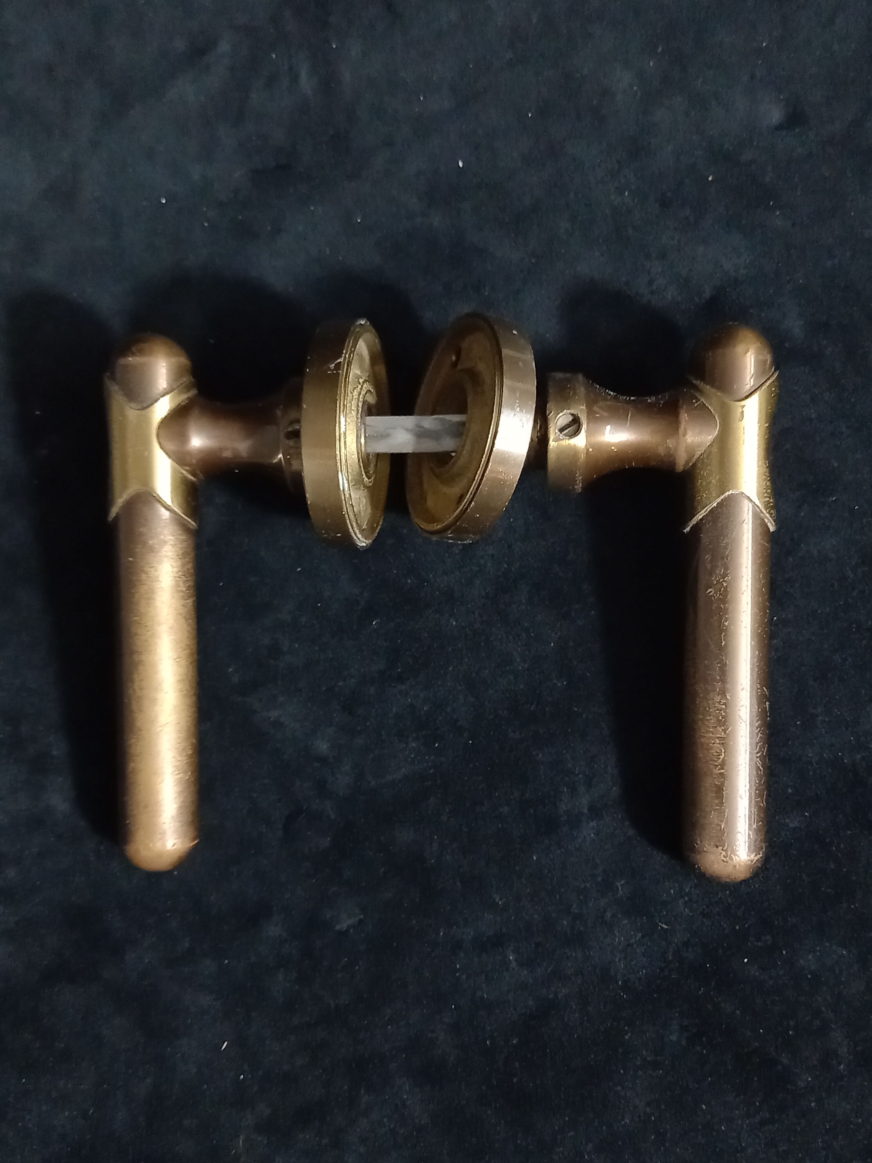 Four pairs of brass door handles with key plates