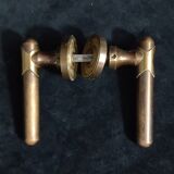Four pairs of brass door handles with key plates