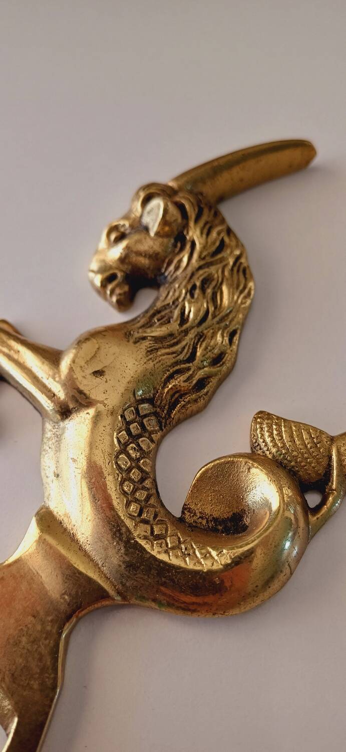 Animal bottle opener in gilded bronze
