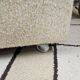 Boucle wool fireside chair and its 1970" vintage pouf