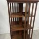 Rotating library in solid walnut, 20th century.