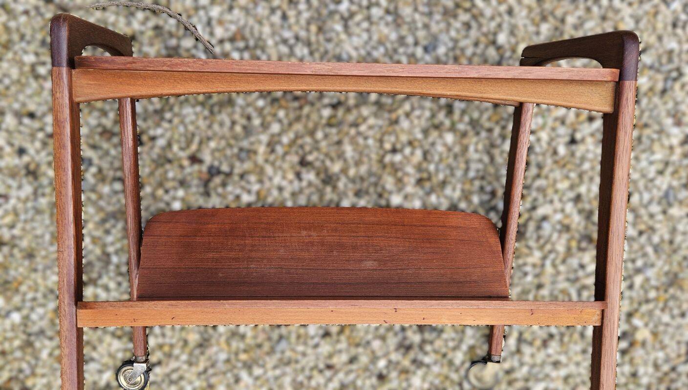 Rolling magazine rack in opal teak by Kleinmobel, 1960