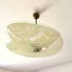 Pale yellow asymmetrical suspension cup 1960