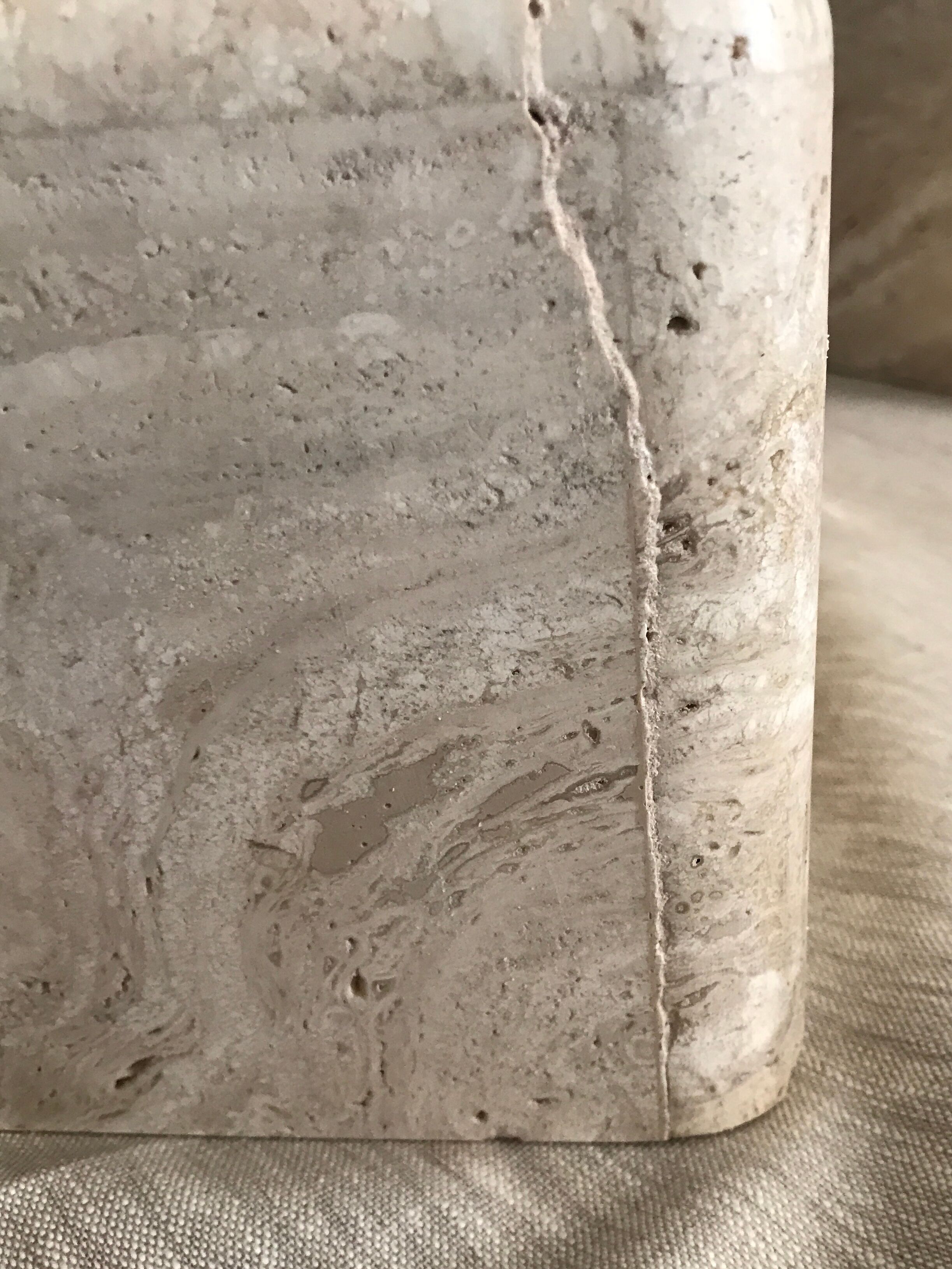 Sculptural travertine coffee table