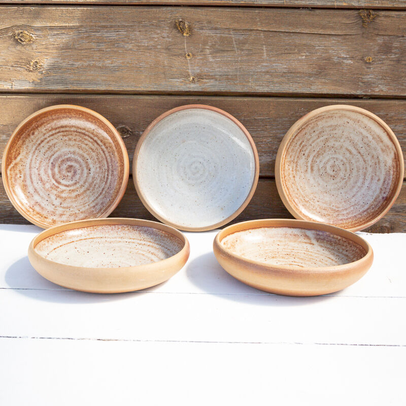 5 hollow stoneware plates Roger Jacques Saint Amand