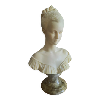 Bust woman on pedestal