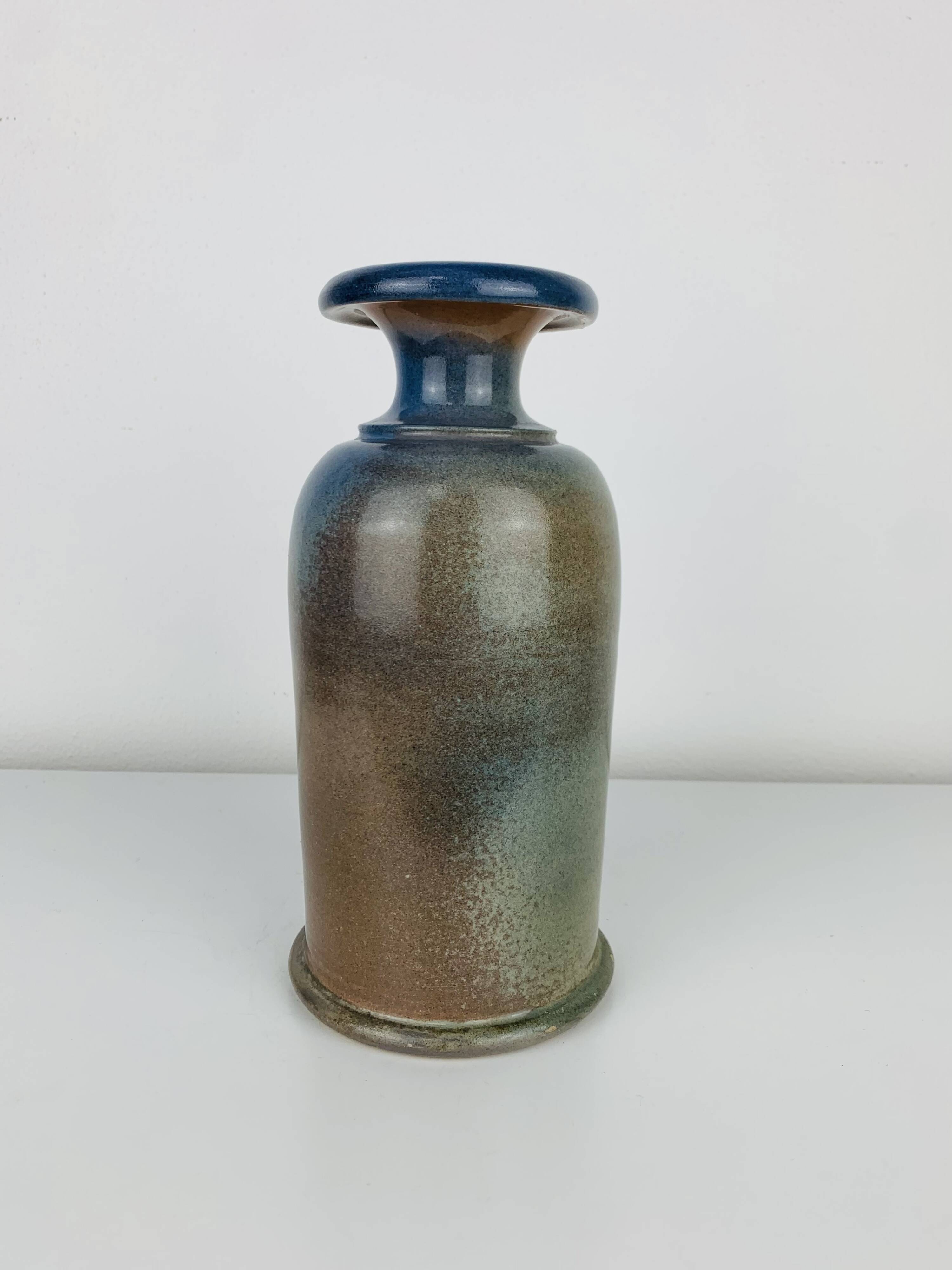 Vintage ceramic bottle vase with a flared neck