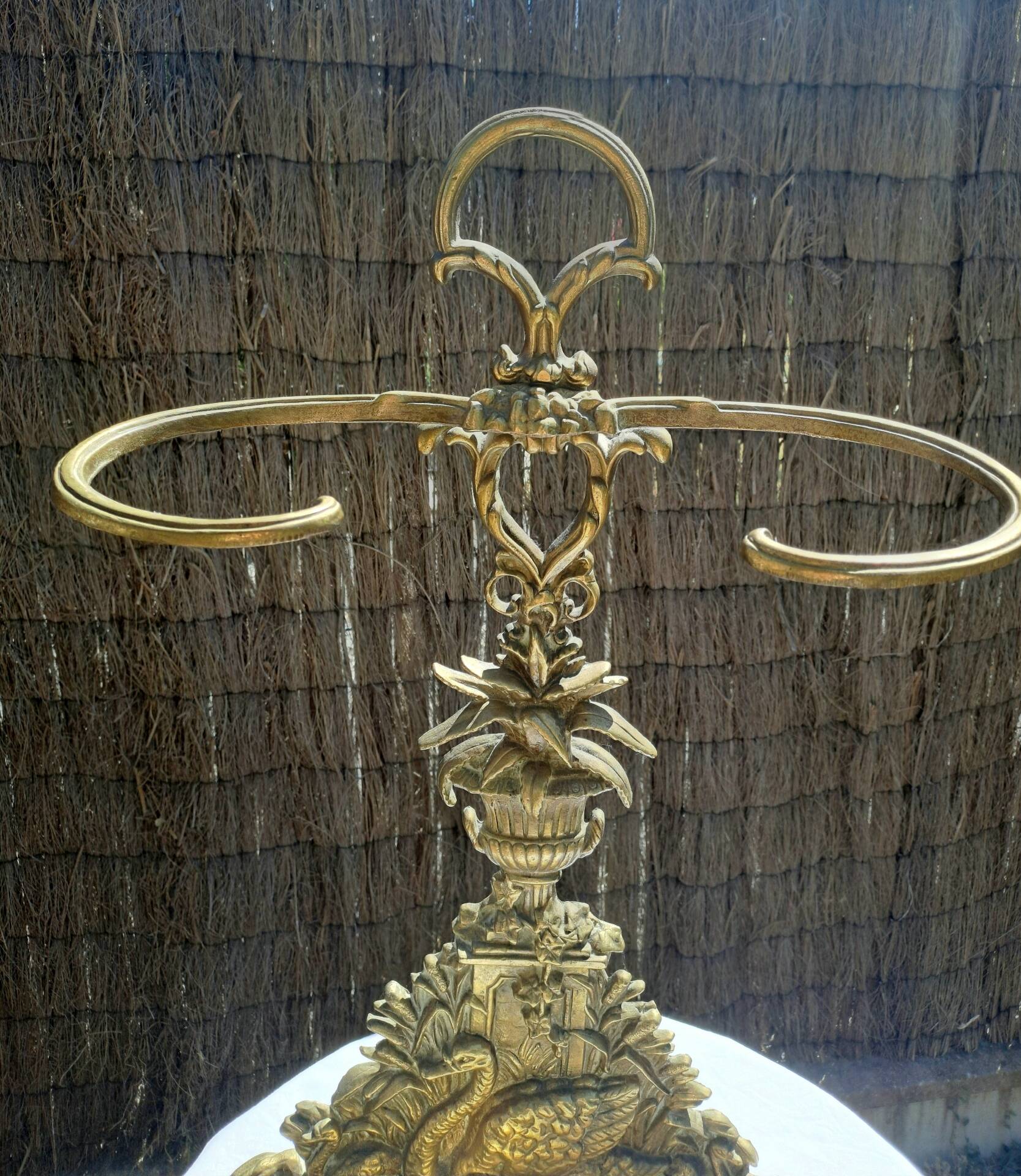Bronze and brass umbrella stand decorated with a swan.