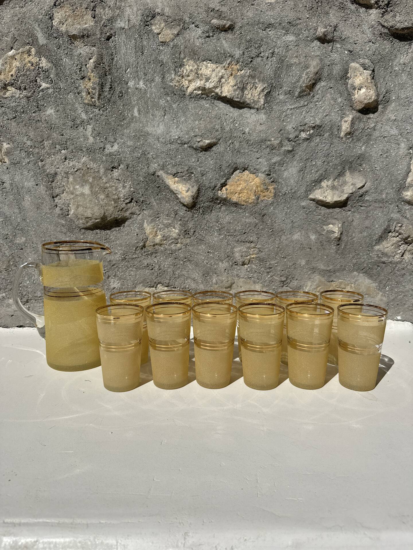 Service for orangeade in frosted glass