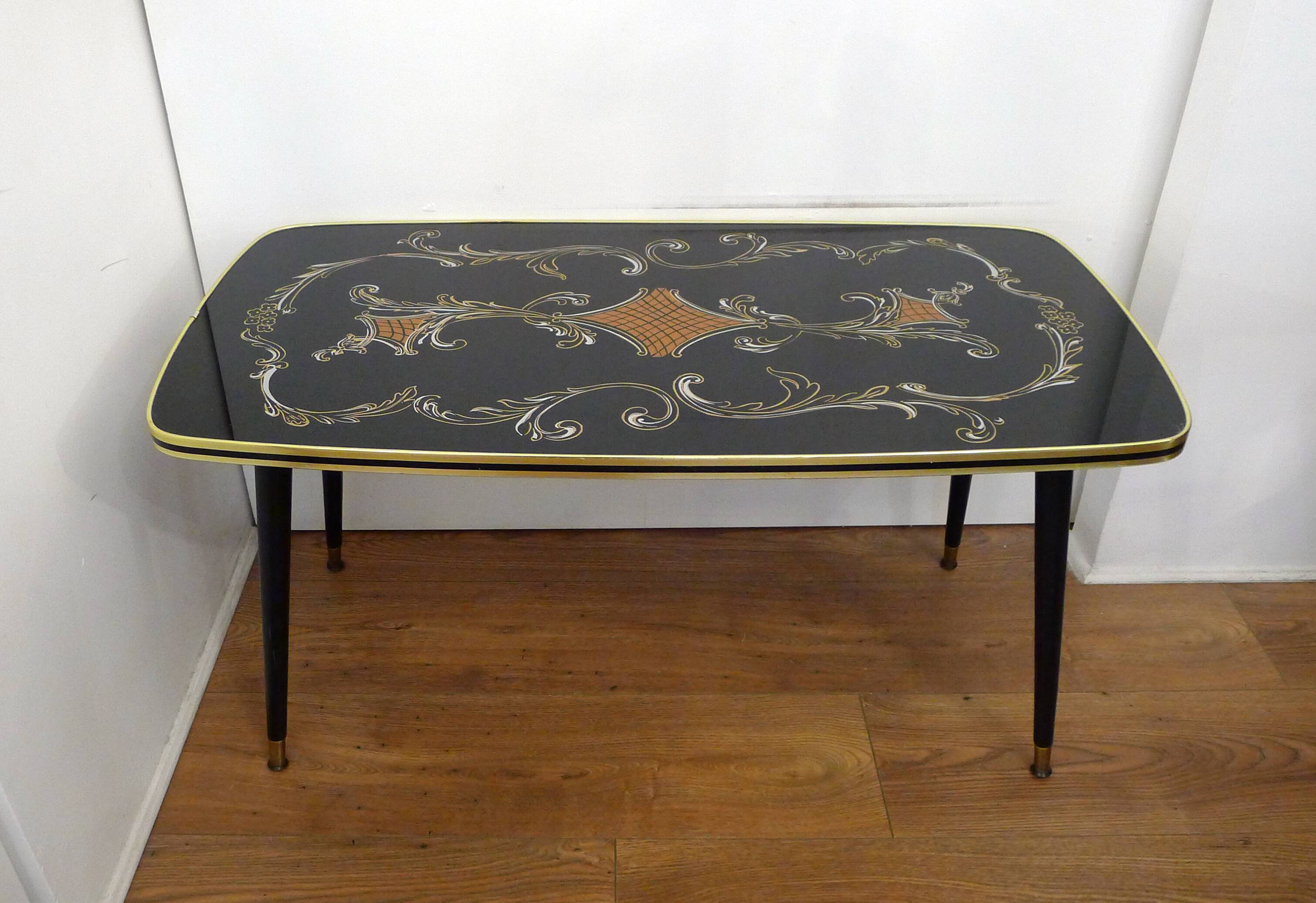 Large coffee table 1960s Rococo style with tapered legs.