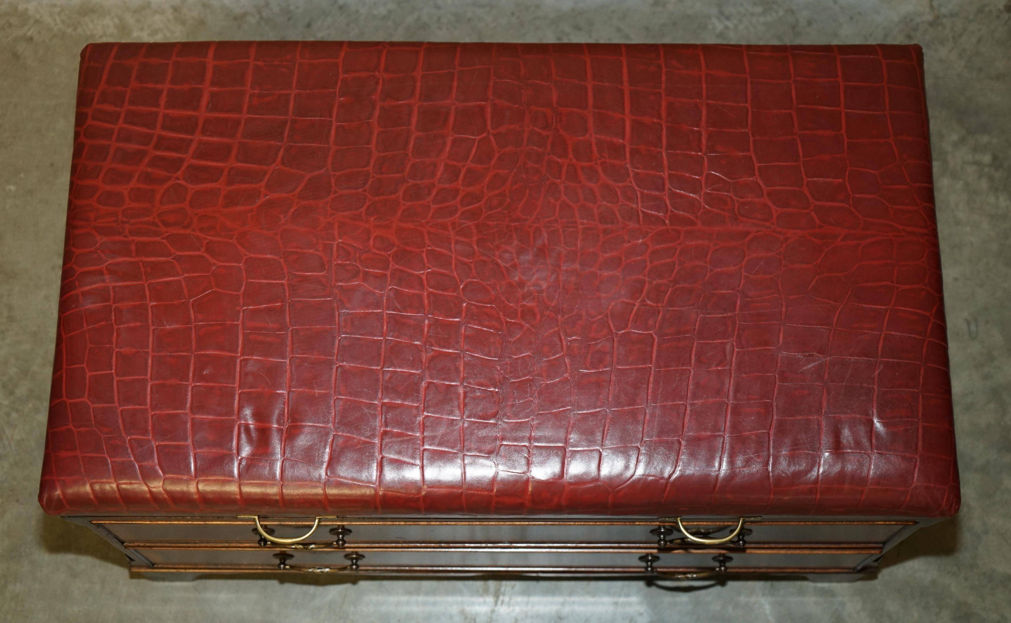 Crocodile leather and hardwood luggage rack in Mid-Century Modern style