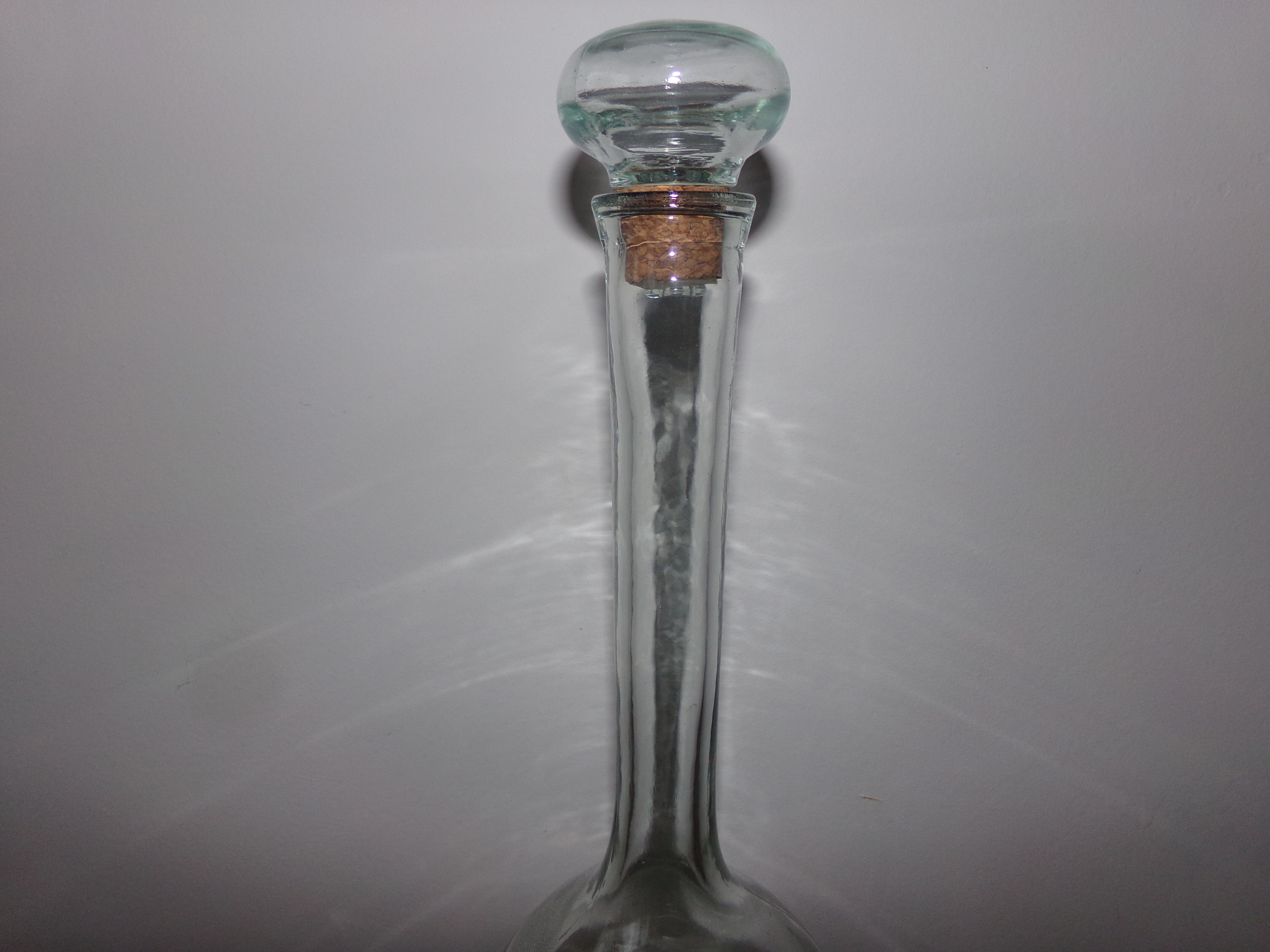 Glass bottle with its cap