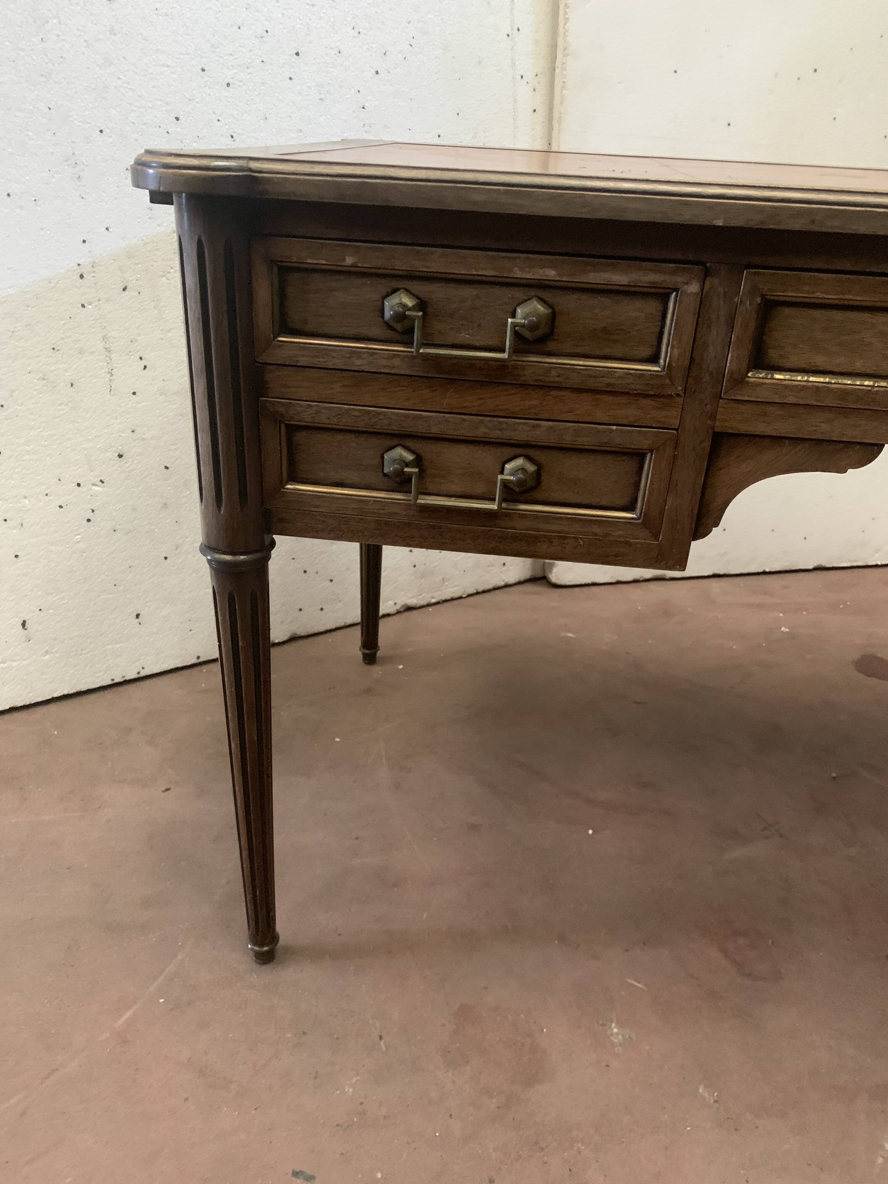 Louis XVI style flat desk in mahogany top of fawn leather XX century