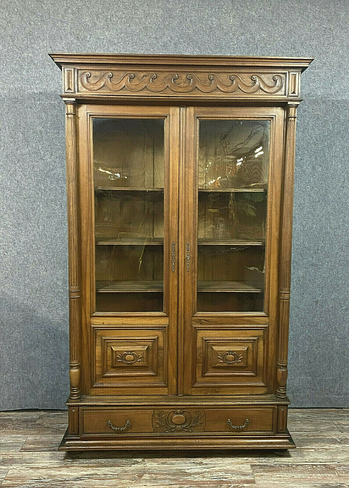Gothic Renaissance library in solid walnut with columns around 1850