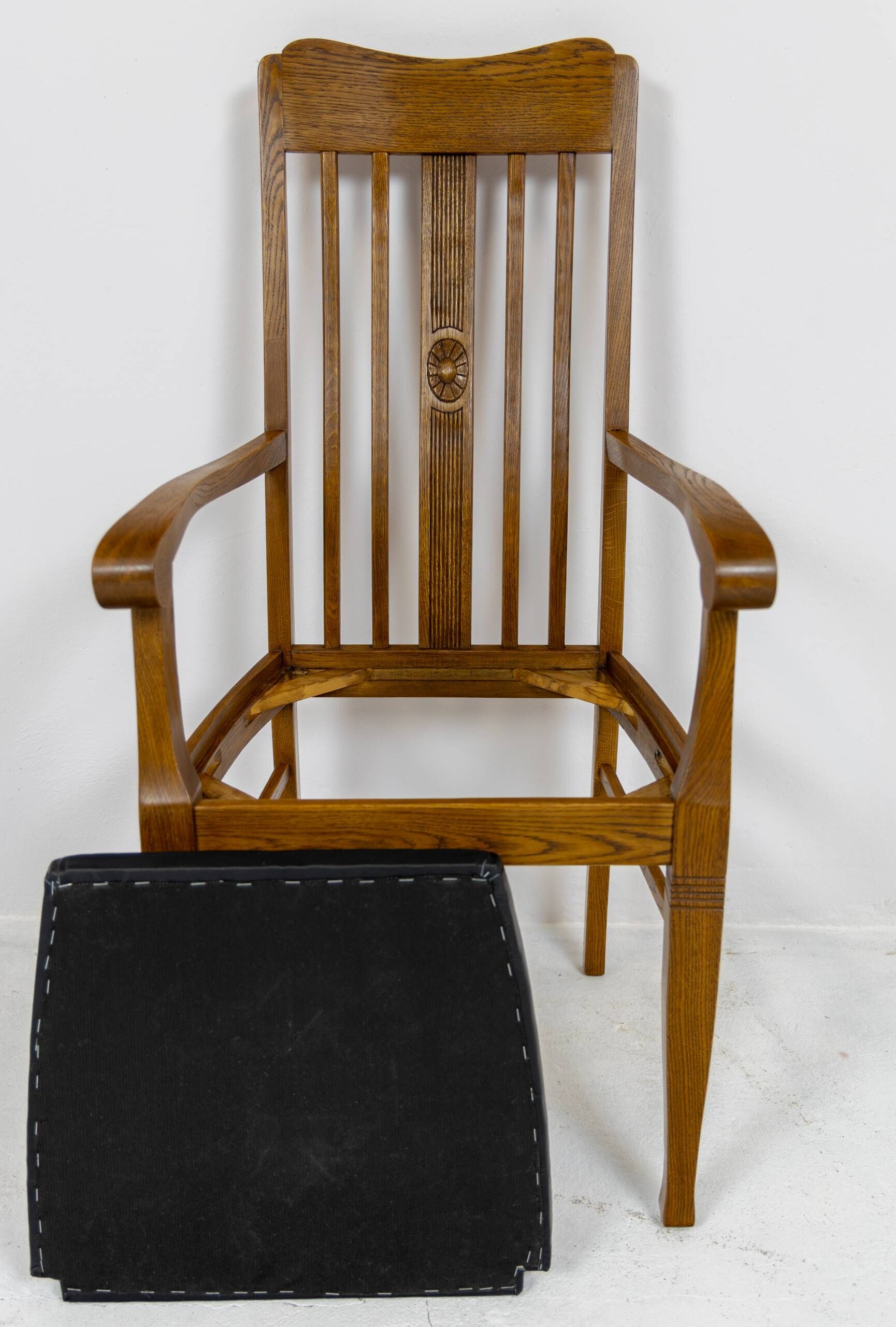 Set of 6 Art Nouveau chairs and armchairs in oak and leather.