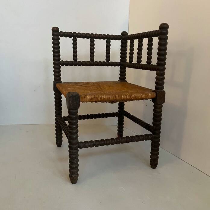 Antique wood and straw fireside seat